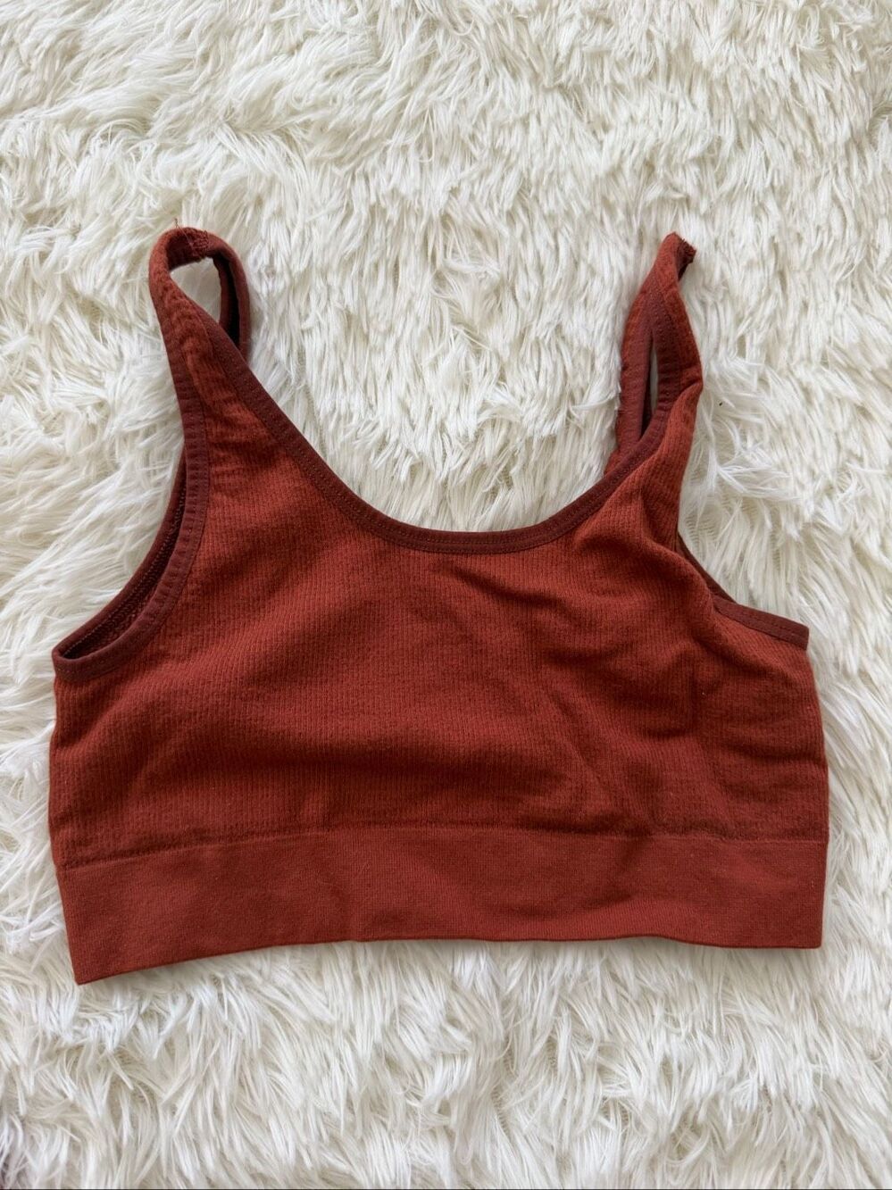 Out from under top / bra size S